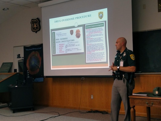 New Hampshire State Trooper Andrew Frigon presents on the N.H. Drug Task Units and observable signs of drug manufacturing and dealing in public places during the annual Ranger Conference on October 25, 2016.
