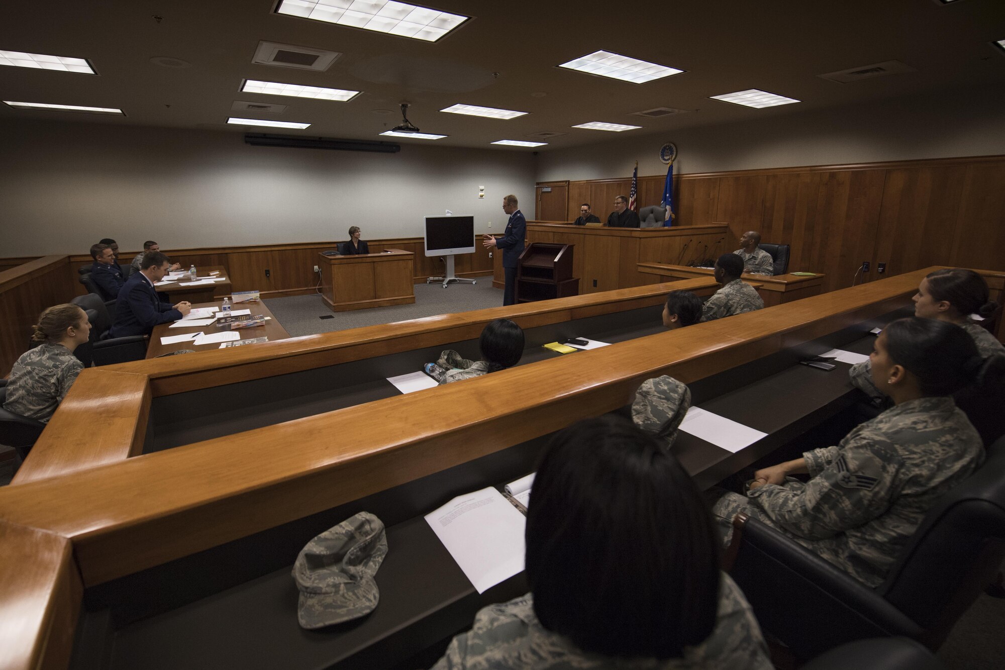 The 23d Wing legal office simulates a courtroom trial during an Emerge Moody course, Jan. 5, 2017, at Moody Air Force Base, Ga. Approximately 20 members are currently enrolled in the nine-month course and met for the fourth time as they continue to learn about the different career fields across the base that contribute to the overall mission. (U.S. Air Force photo by Airman 1st Class Daniel Snider)