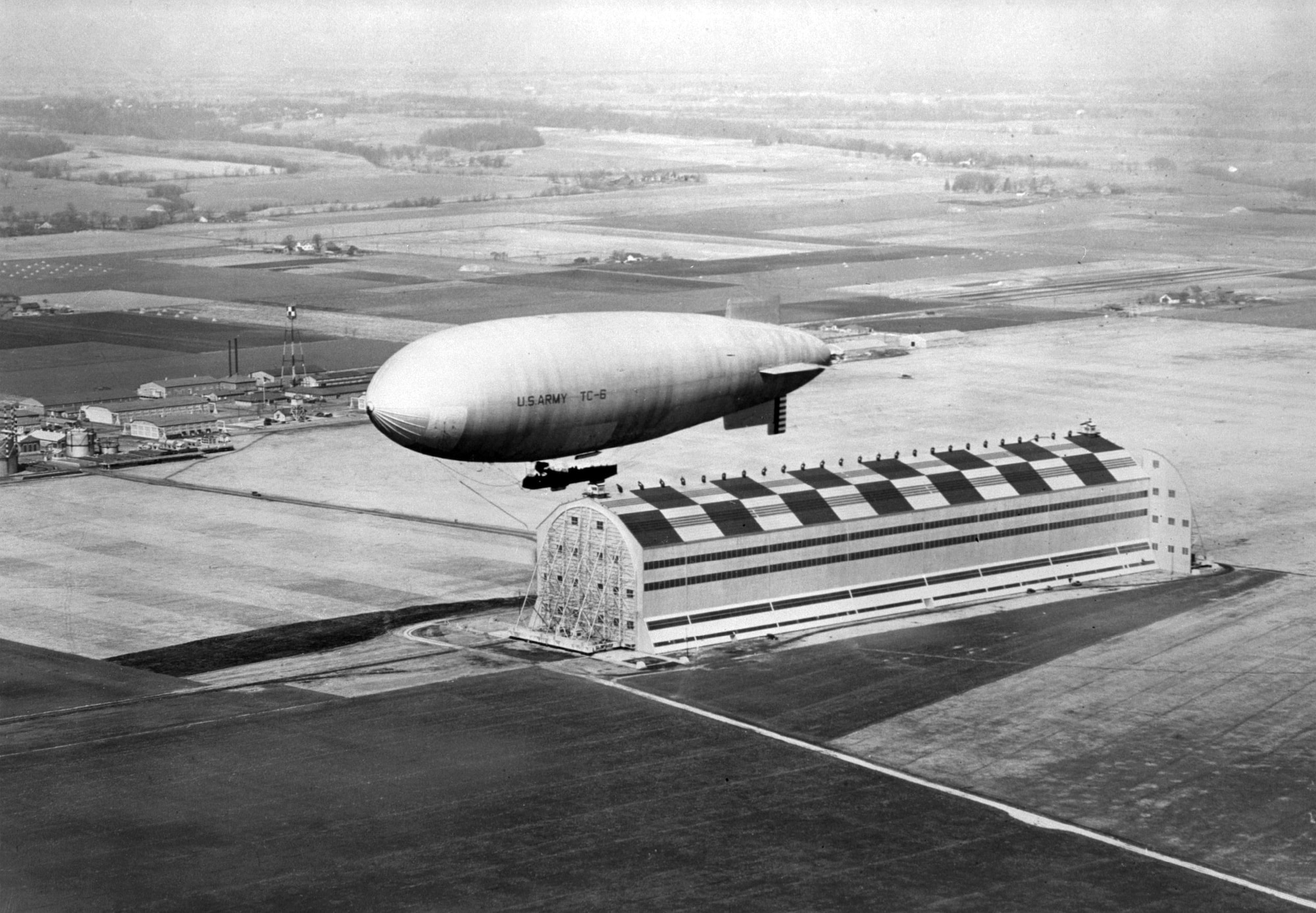 Dirigibles/Balloons, 1921-37: The 12th Balloon Company and 9th Airship Company transferred to Scott Field from Fort Omaha, Neb. Formal lighter-than-air aircraft courses began. At this time, Scott Field had balloons and two small non-rigid airships. Scott’s airships, such as the TC-6 (pictured here) were housed in a facility with the distinction of being the second largest hangar in the world until 1937.