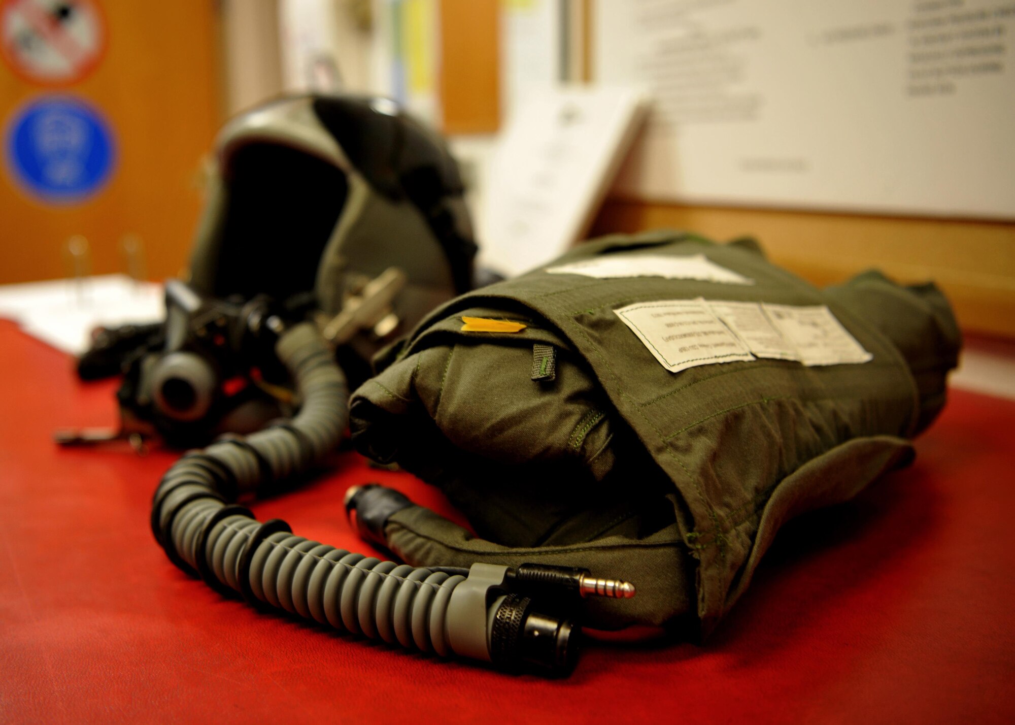 A pilot’s helmet, oxygen mask and anti-g suit are pictured Jan. 5, 2016, at Beale Air Force Base, California. The 9th Operational support Squadron aircrew flight equipment is responsible for all of a pilot’s gear such as helmet, oxygen mask, harness and all life-saving devices. (U.S. Air Force photo/Staff Sgt. Jeffrey Schultze)
