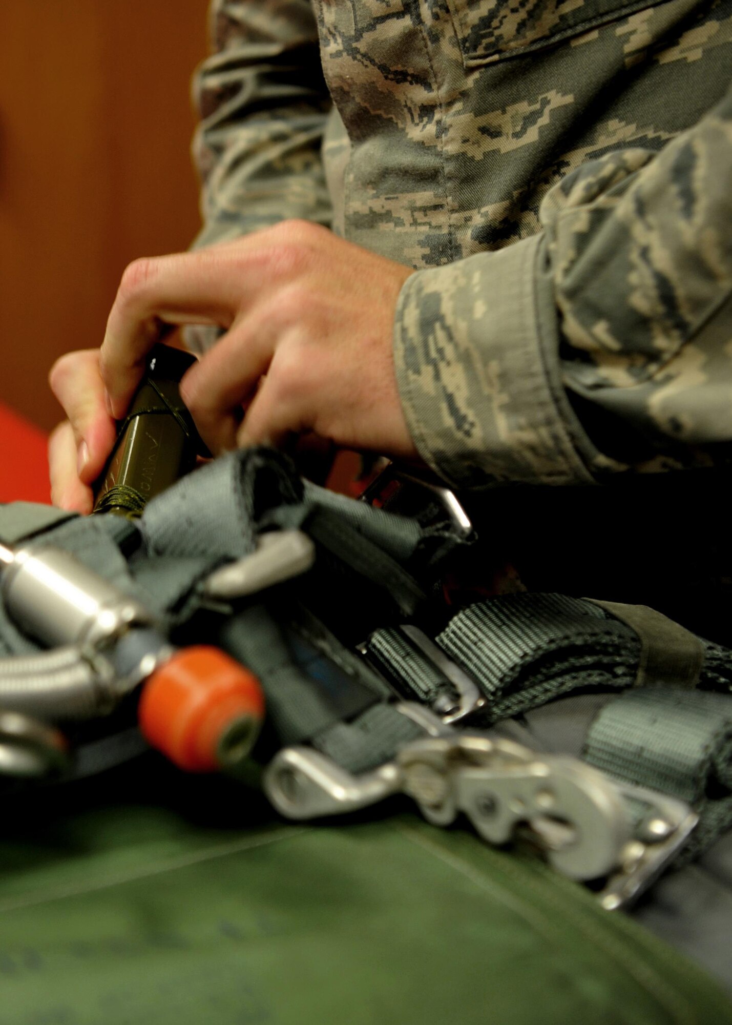 Staff Sgt. Tyler Woodwick, 9th Operational Support Squadron aircrew flight equipment craftsman performs an equipment check on a parachute Jan. 5, 2016, at Beale Air Force Base, California. Aircrew flight equipment personnel manage the inspection, maintenance and adjustments to the devices assigned to the pilots they support. (U.S. Air Force photo/Staff Sgt. Jeffrey Schultze)