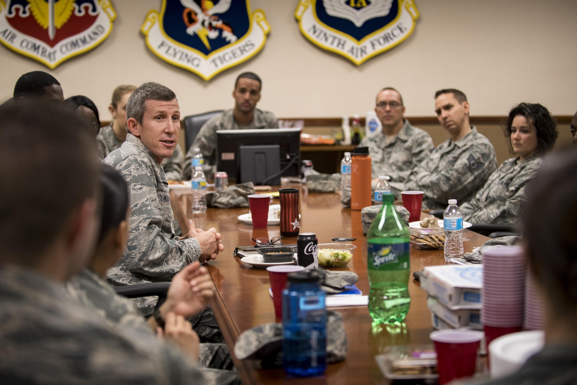 Col. Thomas Kunkel, 23d Wing commander, answers a question during an Emerge Moody luncheon, Jan. 5, 2017, at Moody Air Force Base, Ga. Kunkel and Chief Master Sgt. Jarrod Sebastian, 23d WG command chief, spoke with Airmen and answered questions during lunch. (U.S. Air Force photo by Airman 1st Class Daniel Snider)