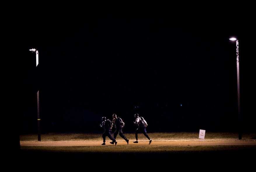Airmen from the 315th Airlift Wing participate in a relay race to kick off the Warrior Challenge Jan. 5, 2017, at Joint Base Charleston, S.C. The team building event brought together Airmen from various agencies throughout the 315th AW for a friendly competition. Eight teams, averaging four Airmen per team, participated in the challenge. (U.S. Air Force photo by Senior Airman Tom Brading)