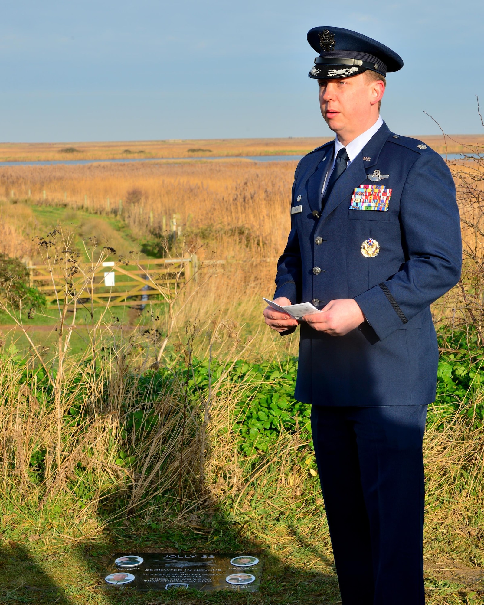 Lt. Col. Bernard Smith, 56th Rescue Squadron commander, speaks during the Jolly 22 memorial dedication, Jan. 6, 2017. Three years ago, the 56th Rescue Squadron and 48th Fighter Wing felt the tragic loss of four Liberty Airmen, when an HH-60G Pave Hawk crashed on the Norfolk coast while participating in a low-level training mission Jan. 7, 2014. (U.S. Air Force photo/Staff Sgt. Stephanie Longoria)