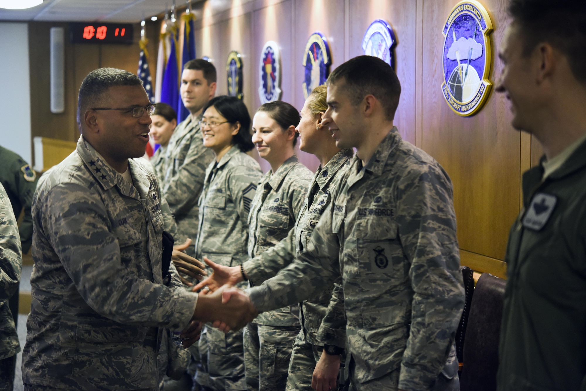 U.S. Air Force Lt. Gen. Richard Clark, 3rd Air Force commander, greets Airmen before a briefing on future construction projects at Royal Air Force Lakenheath, England, Jan. 6. This was one of the many stops Clark made around the Liberty Wing as part of an immersion tour. (U.S. Air Force photo/Airman 1st Class Eli Chevalier)