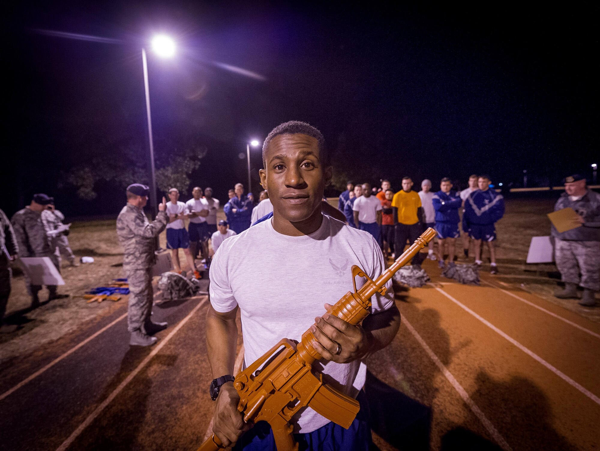 Senior Airman Jeremiah Griffin, 315th Airlift Wing Security Forces journeyman, helps demonstrate various events for the Warrior Challenge for participants January 5, 2017, at Joint Base Charleston, S.C. The team building event brought together Airmen from various agencies throughout the 315th AW for a friendly competition. Eight teams, averaging four Airmen per team, participated in the challenge. (U.S. Air Force photo by Senior Airman Tom Brading)