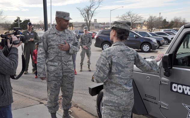 Christmas came early for Master Sgt. Steven, with the 552nd Air Control Network squadron and his wife, Joann. Sergeant Steven was the Air Force Club’s winner of a 2017 Jeep Wrangler. Joann said she received a call a week prior to them announcing her husband as the winner. “It was hard to keep the secret,” she said. “We never win anything!” The announcement was made during an impromptu commander’s call and everyone went outside for a safety briefing on winterizing a vehicle. Sergeant Steven had no clue that the Dallas Cowboys decorated silver Jeep was his prize. “When I saw the car, I was instantly jealous — I wanted that car!” said Sergeant Steven. Little did he know, it was already his.  Out of 11,000 entries Air Force wide, Jonathan Boyd, Chief of Non Appropriated Funds Food and Beverage, said Sergeant Steven had entered 20 times. “People do win,” said Mr. Boyd. “I encourage everyone to support their club—those dollars go to provide these types of programs and giveaways.” (Air Force photo by Annette Crawford)