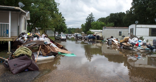 Piles of debris line the side of the roads in flood affected areas one week after the 2016 severe flooding in Baton Rouge, Louisiana.