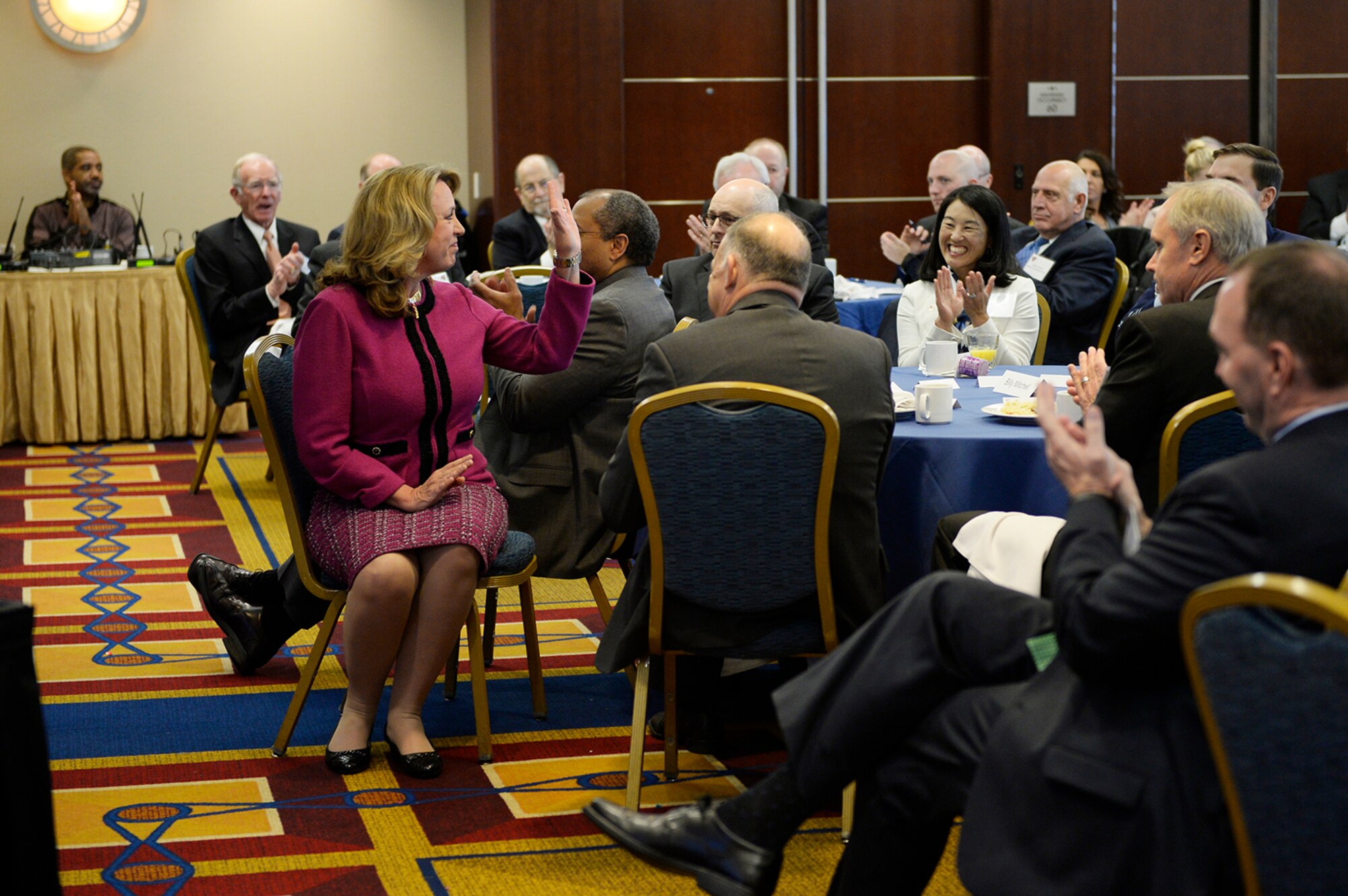 Air Force Secretary Deborah Lee James waves to attendees at the Air Force Association's Breakfast Series in Arlington, Va., Jan. 6, 2017. The Air Force Association's Breakfast Series brings together industry partners, the international attaché corps, and both military and civilian leadership for informative briefings on a monthly basis for updates on relevant current initiatives. (U.S. Air Force photo/Tech. Sgt. Joshua L. DeMotts)