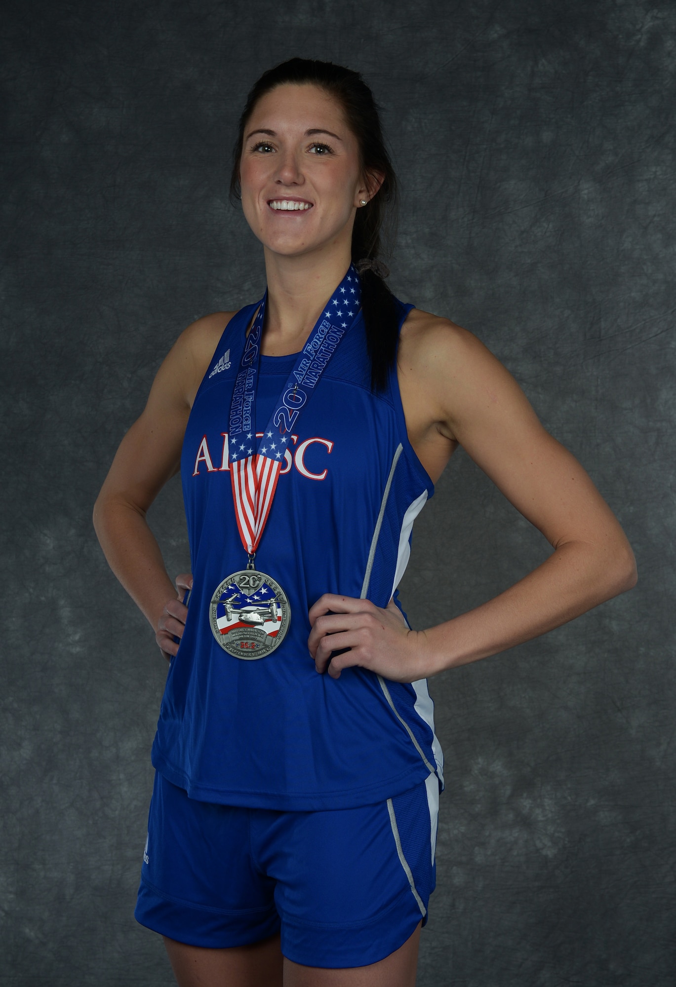 Second Lt. Kimberly Davis, 742nd Missile Squadron missile combat crew member, wears her Air Force Global Strike Command team uniform at Minot Air Force Base, N.D., Dec. 15, 2016. Davis has competed in events like swimming in the 2012 U.S. Olympic team trials in Omaha, Nebraska, and running in the 2016 Air Force Marathon in Dayton, Ohio. (U.S. Air Force photo/Airman 1st Class Jonathan McElderry)