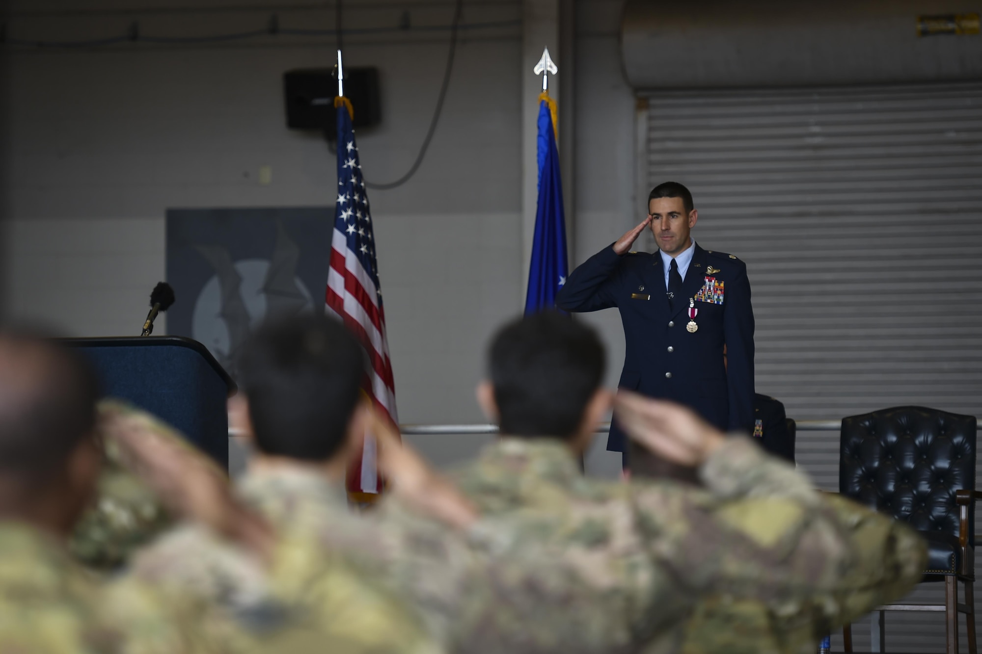 Lt. Col. Jason Allen, outgoing commander of the 15th Special Operations Squadron, gives his flight a farewell salute during a change of command at Hurlburt Field, Fla., Jan. 6, 2017. Allen relinquished command of the 15th SOS to incoming commander, Lt. Col. Michael Haack. (U.S. Air Force photo by Airman 1st Class Joseph Pick)