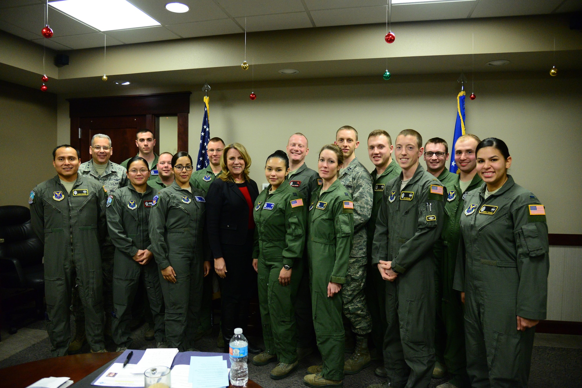 Secretary of the Air Force Honorable Deborah Lee James poses for a photo with missileers at Malmstrom Air Force Base, Mont., Jan. 5, 2017. During her visit, James discussed improvements in morale, innovation and modernization with company grade officers in operations about what changes still need to be considered to improve the nuclear enterprise. (U.S. Air Force photo/Airman 1st Class Magen M. Reeves)