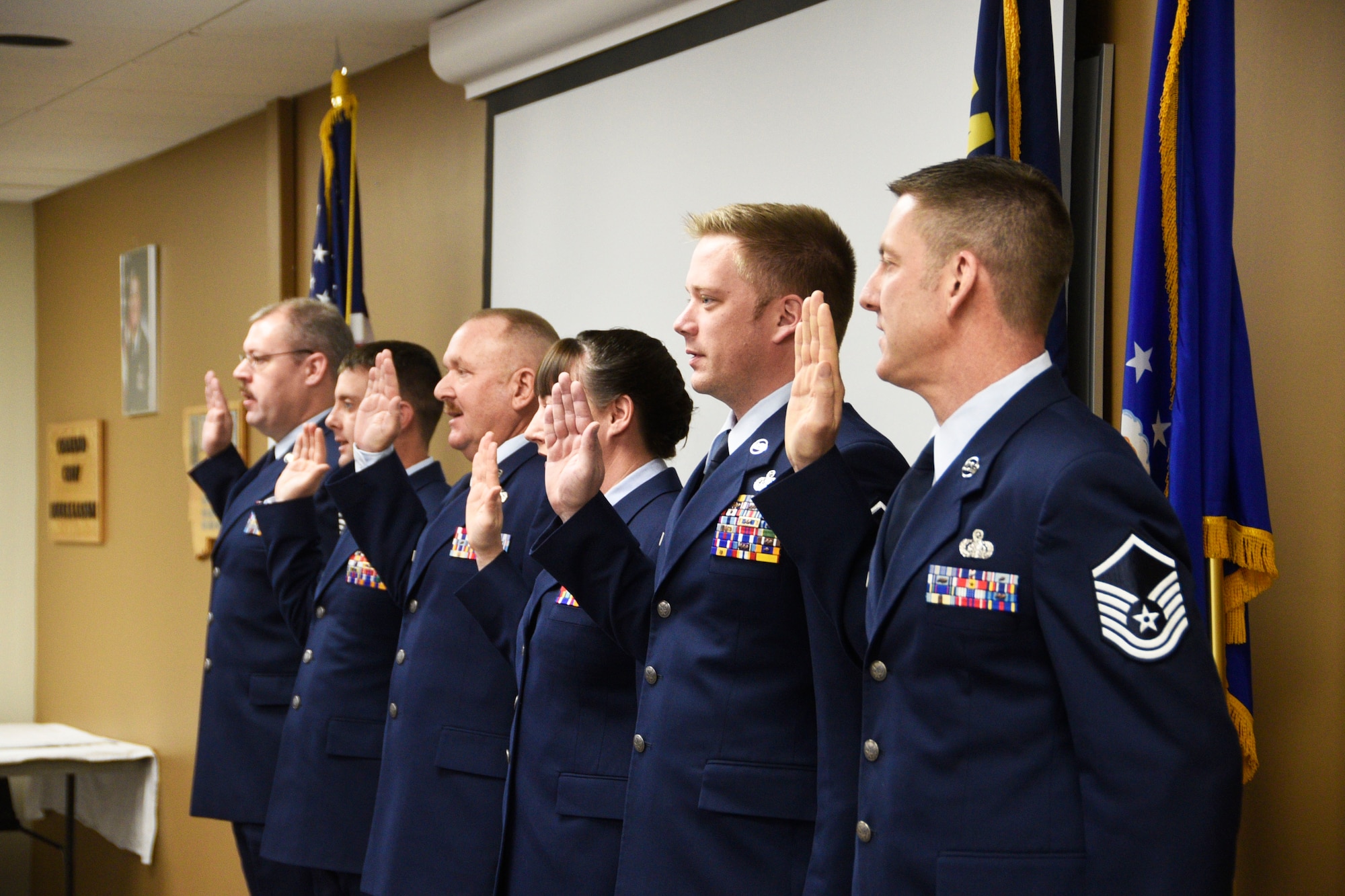 Newly promoted master sergeants take the oath during the Senior NCO Induction Ceremony held at the 120th Airlift Wing in Great Falls, Mont. Dec. 4, 2016. (U.S. Air National Guard photo/Senior Master Sgt. Eric Peterson)