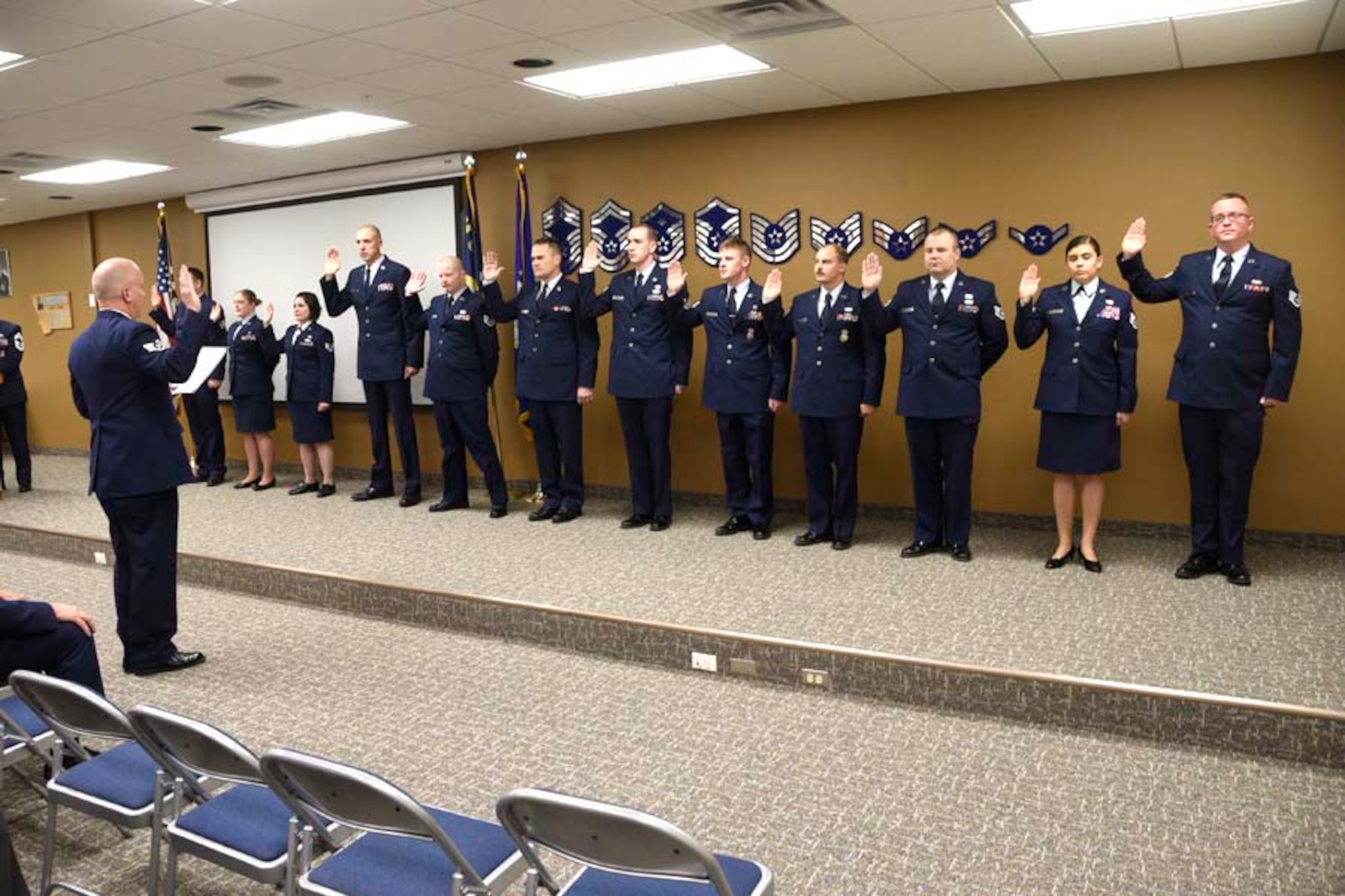 Newly promoted staff sergeants take the oath during the NCO Induction Ceremony held at the 120th Airlift Wing in Great Falls, Mont. Dec. 4, 2016. (U.S. Air National Guard photo/Senior Master Sgt. Eric Peterson)