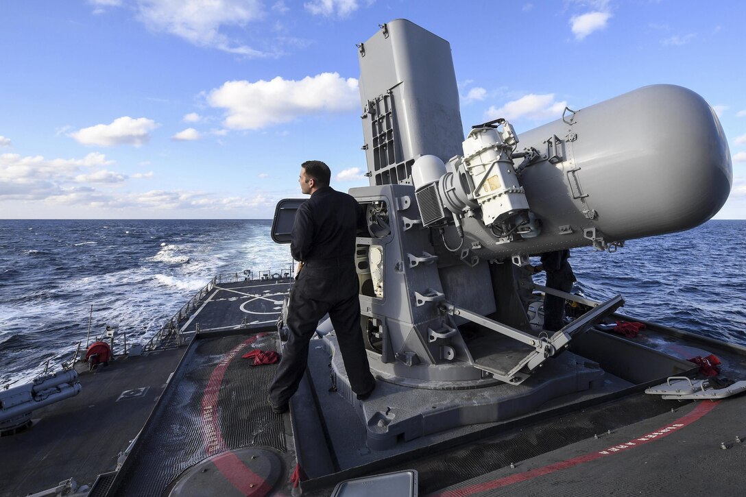 Navy Petty Officer 2nd Class Spencer Bagwell conducts maintenance work on a close-in weapon system aboard the guided missile destroyer USS Porter in the Mediterranean Sea, Jan. 4, 2017. The Porter is conducting naval operations in the U.S. 6th Fleet area of responsibility to support U.S. national security interests in Europe. Bagwell is a fire controlman. Navy photo by Seaman Ford Williams