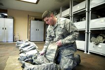 Staff Sgt. Stevie Haut, 926th Security Forces Squadron supply custodian,  ensures a bag has all the necessary equipment for 926th SFS Airmen undergoing training Jan. 7 at Nellis Air Force Base, Nevada. Haut was recently named Air Force Reserve Command’s Outstanding Security Forces Air Reserve Component Airman of 2016. (U.S. Air Force photo by Senior Airman Alexandria Slade)