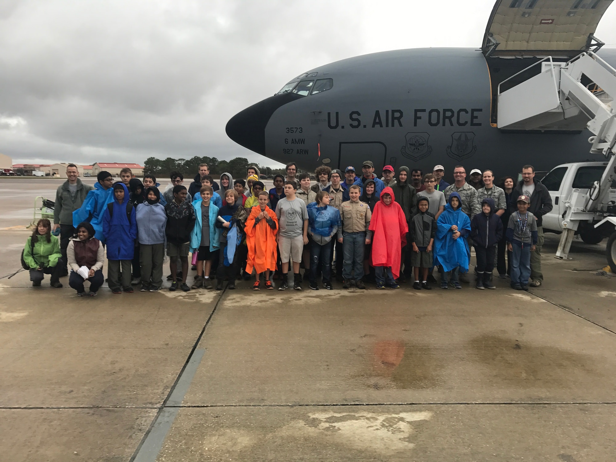 Boy Scouts of America (Troop 68) pose for a group photo at MacDill Air Force Base, FL Jan. 7, 2017. The BSA provides a program for young people that builds character, trains them in the responsibilities of participating citizenship, and develops personal fitness. (U.S. Air Force photo by Staff Sgt. Xavier Lockley)