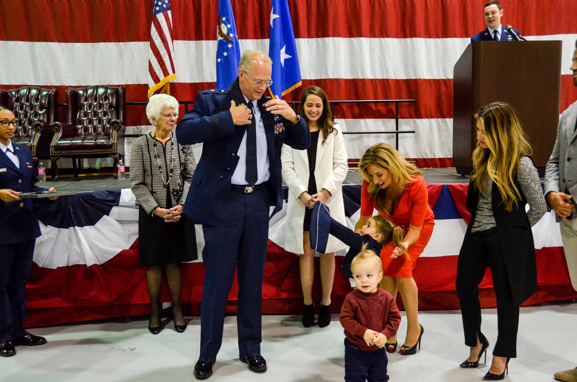 Family members finish pinning the a one-star insignia onto Brig. Gen. Steven Parker's uniform during a promotion ceremony held at Dobbins Air Reserve Base on Jan. 6, 2017. Parker will be the first one-star general to serve as the 94th Airlift Wing commander since 2006. (U.S. Air Force photo / Tech. Sgt. Kelly Goonan)