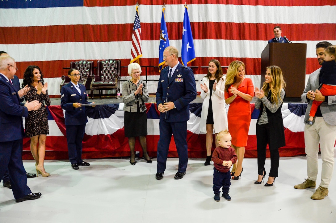 Family members finish pinning the one-star rank insignia onto Brig. Gen. Steven Parker's uniform during a promotion ceremony held at Dobbins Air Reserve Base on Jan. 6, 2017. Parker will be the first one-star general to serve as the 94th Airlift Wing commander since 2006. (U.S. Air Force photo / Tech. Sgt. Kelly Goonan)