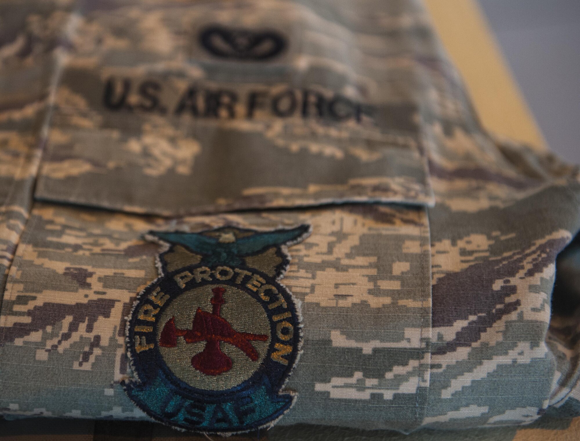 A uniform of an 18th Civil Engineer Squadron firefighter sits ready for use inside a fire station at Kadena Air Base, Japan, Jan. 5, 2017. The 18th CES fire department is the Air Force’s largest and busiest fire department in the Pacific region. (U.S. Air Force photo by Airman 1st Class Nick Emerick/Released) 