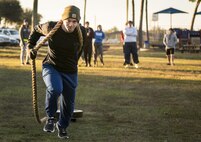Airman 1st Class Mickel Cssszar, development and training flight, pulls a weight sled during a chilly 23 degree morning physical training session Jan. 8 at Duke Field.  The Airmen within the flight attend the monthly training assembly and learn about the Air Force and Reserve prior to going to basic military training.  (U.S. Air Force photo/Tech. Sgt. Sam King)