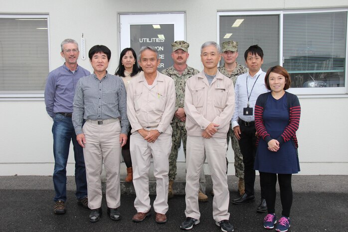 Utilities and Energy Management personnel posed for their annual office photo at Marine Corps Air Station Iwakuni, Japan, 2016. The team helped MCAS Iwakuni reach gold-installation status for the Secretary of the Navy Energy and Water Management Award by submitting data of the air station’s utility and energy consumption to Headquarters Marine Corps. MCAS Iwakuni earned the title for the second year in a row for efficiently conserving energy. (courtesy photo)