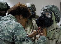 A chemical, biological, radiological, and nuclear defense face mask is displayed during a CBRN defense course at Ramstein Air Base, Germany, Jan. 5, 2017. CBRN defense protective measures are taken in situations where CBRN warfare hazards may be present. (U.S. Air Force photo by Airman 1st Class Savannah L. Waters)