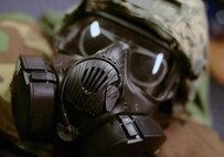 A chemical, biological, radiological, and nuclear defense face mask is displayed during a CBRN defense course at Ramstein Air Base, Germany, Jan. 5, 2017. CBRN defense protective measures are taken in situations where CBRN warfare hazards may be present. (U.S. Air Force photo by Airman 1st Class Savannah L. Waters)