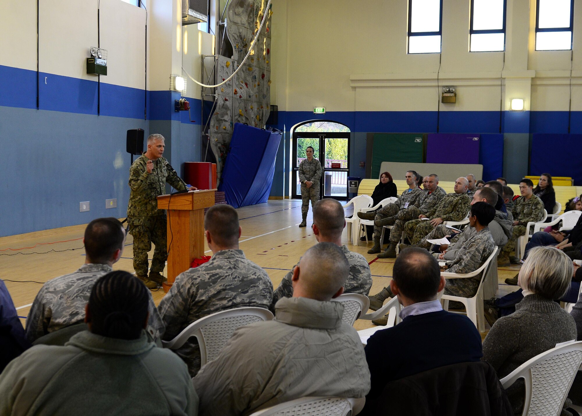 Navy Capt. Michael Oestereicher, NAVFAC EURAFSWA commander, speaks to team Aviano members during the official grand opening event of the Aviano Air Base Library on Jan. 6, 2017. The library’s amenities include free Wi-Fi throughout the building, computer access and a children’s area. (U.S. Air Force photo by Senior Airman Cary Smith)