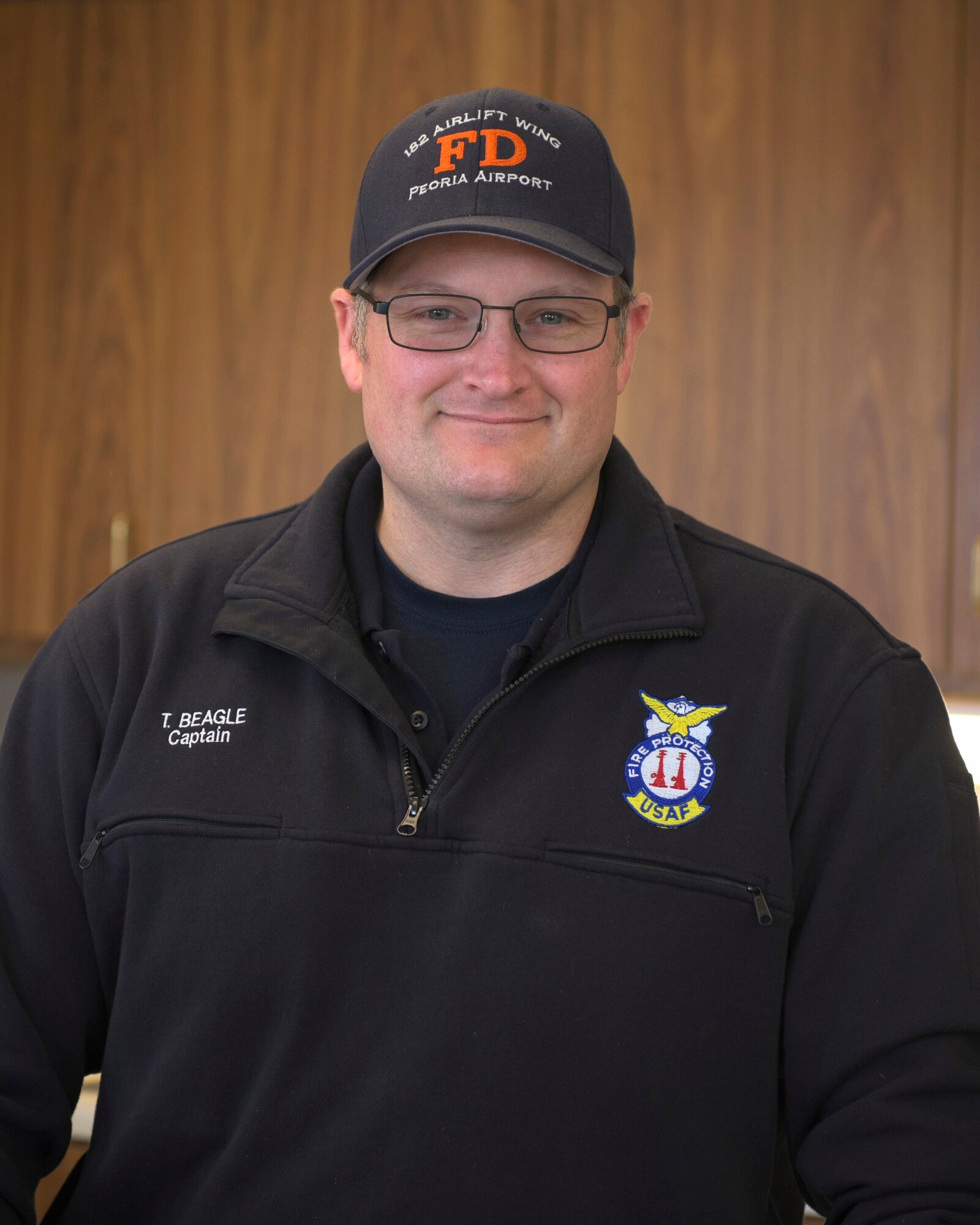 Tobey Beagle, a captain with the Illinois Department of Military Affairs at the 182nd Civil Engineer Squadron fire department, gives an interview about winter weather safety in Peoria, Ill., Jan. 7, 2017. He said wearing layers is important if you do have to be outside, as well as covering skin by wearing gloves, hats and earmuffs. (U.S. Air National Guard photo by Tech. Sgt. Lealan Buehrer)