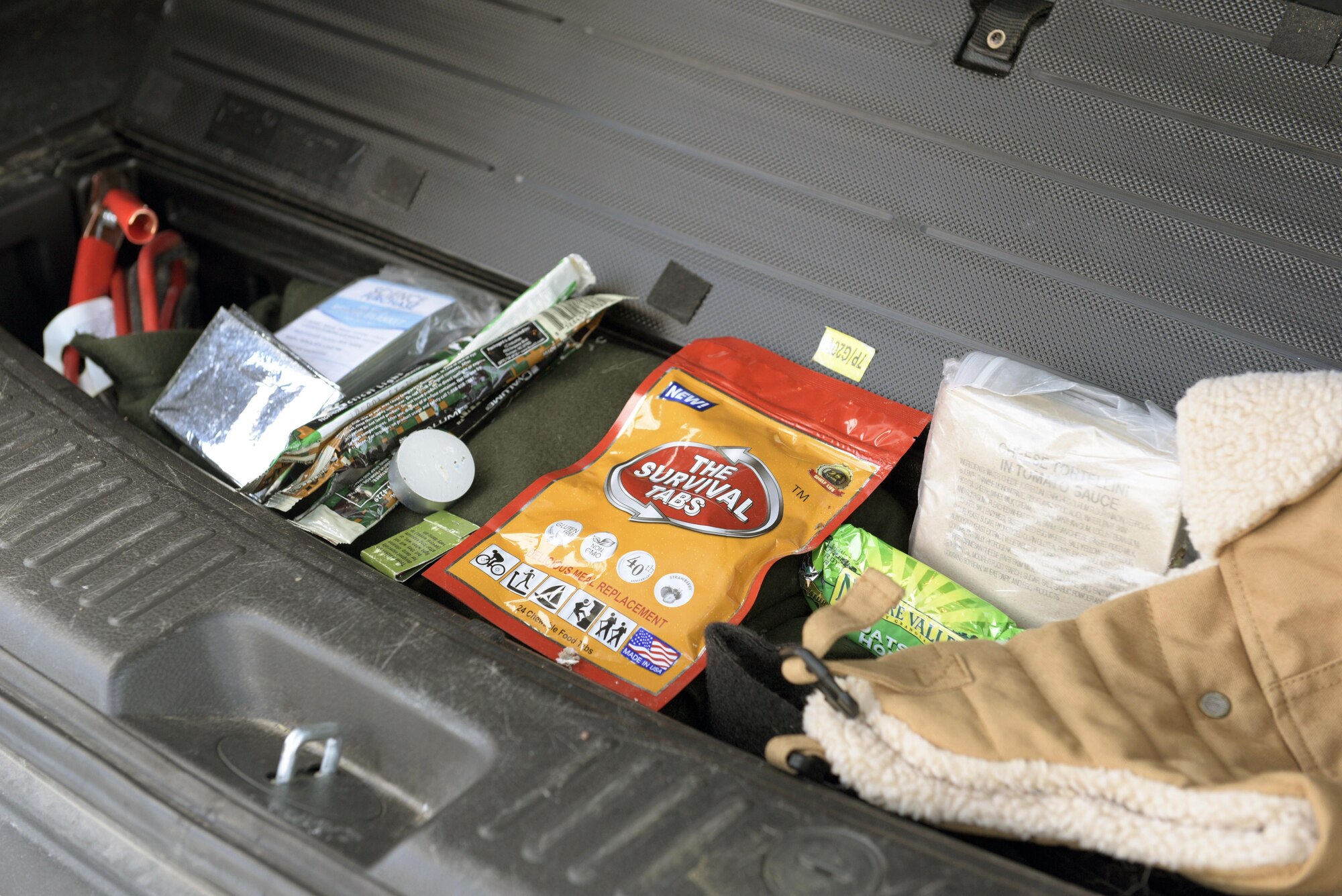 Pictured are winter survival items located in the back of a vehicle in Peoria, Ill., Jan. 7, 2017. In the event of becoming stranded, items such as a blanket, flashlight, cellphone charger and snacks, said Tech. Sgt. Cindy Hawkins, a safety specialist with the 182nd Airlift Wing. (U.S. Air National Guard photo by Airman 1st Class Jason Grabiec)