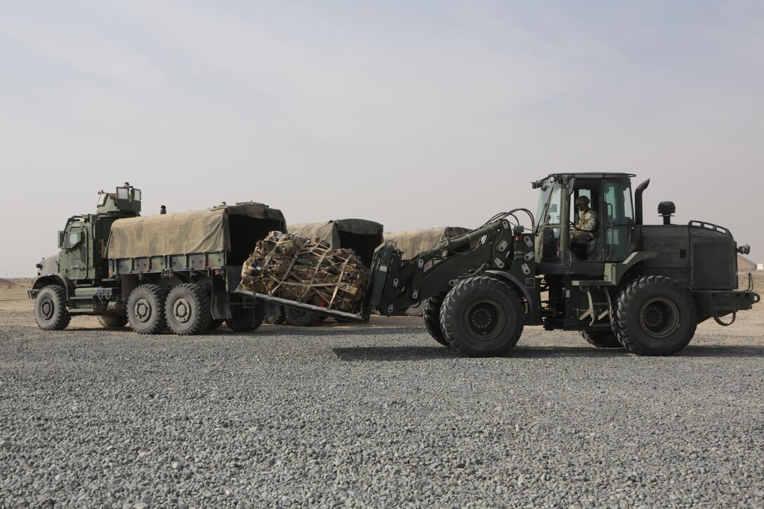 Marine Lance Cpl. Joshua Perez-Lopez, a heavy equipment operator with Marine Wing Support Squadron 371, Special Purpose Marine Air-Ground Task-Force Crisis Response- Central Command, moves pallets to be loaded onto a KC-130 J, Dec. 27, 2016. The Marines conducted this sustainment training to ensure operational readiness for a variety of contingencies. SPMAGTF Marines consistently train to improve their ability to react to any scenario they may encounter while conducting USCENTCOM’s crisis response mission. 
