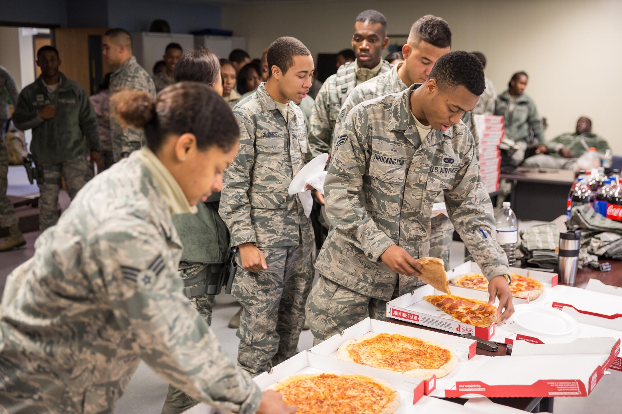 Airmen from the 315th Airlift Wing Security Forces Squadron enjoyed a pizza luncheon Jan. 6, 2017 at Joint Base Charleston.  
A Charleston area church provided the pizza, which is a show of support for deploying Airmen and led by the 315th AW Chaplaincy Service.  (U.S. Air Force photo by Master Sgt. Shane Ellis)

