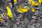 A group of Advanced Individual Training Soldiers from Joint Base San Antonio cheer on the East versus the West at the San Antonio Alamodome during the 2017 U.S. Army All-American Bowl. The All-American Bowl is the nation’s premier high school football game, which was played Jan. 7. 