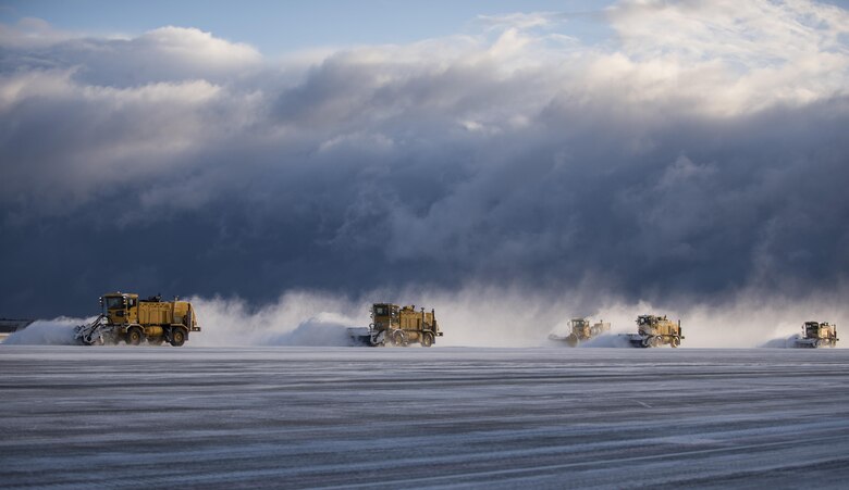 Members from the 35th Civil Engineer Squadron operate air blast sweepers on the runway at Misawa Air Base, Japan Feb. 24, 2016. Airmen from the 35th CES ensure the flying mission is carried out and the base populous is able to safely commute during the winter. (U.S. Air Force photo/Senior Airman Brittany A. Chase)