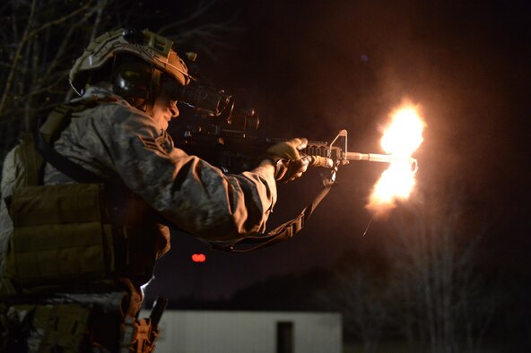 Airman 1st Class Sean Carnes, a 1st Combat Camera Squadron combat photojournalist, fires an M4 carbine rifle as part of tactics training during exercise Scorpion Lens 2016 at Fort Jackson, S.C., March 7, 2016. The exercise was twofold containing the Scorpion Lens portion, which is dedicated to advanced weapons and tactical training, and the flash bang portion, which practices photography and videography documentation standards in combat situations. (U.S. Air Force photo/Staff Sgt. Jonathan Snyder)
