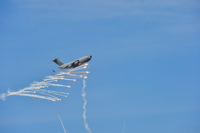 A C-17A Globemaster III from Dover Air Force Base, Del., expends countermeasure flares to defeat a simulated surface-to-air missile shot from a Man-Portable Aircraft Survivability Trainer system March 24, 2016, at the Bollen Live-Fire Range Complex on Fort Indiantown Gap, Pa. A total of 240 flares were expended for the aircraft during the training mission. (U.S. Air Force photo/Senior Airman William Johnson)