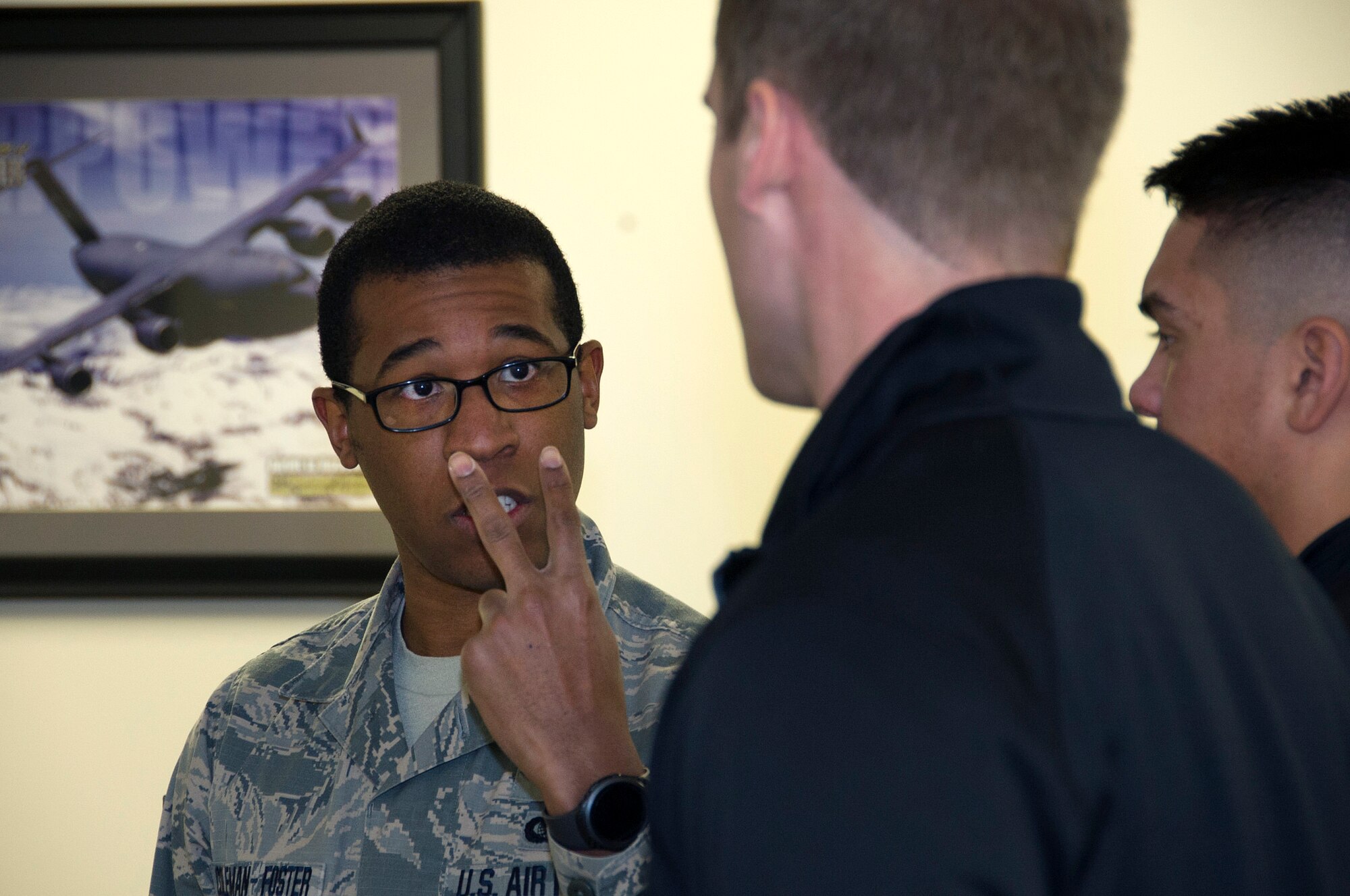 SCHRIEVER AIR FORCE BASE, Colo. -- Former Military Training Instructor, Staff Sgt. Matthew Coleman-Foster, instructs a Delayed Enlistment Program trainee to look him in the eyes on Saturday, Jan. 7th, 2017. Staff Sgt. Coleman-Foster assisted in teaching the DEP trainees important drill and ceremony techniques that they will utilize in Basic Military Training. (U.S. Air Force photo/Staff Sgt. Christopher Moore)
