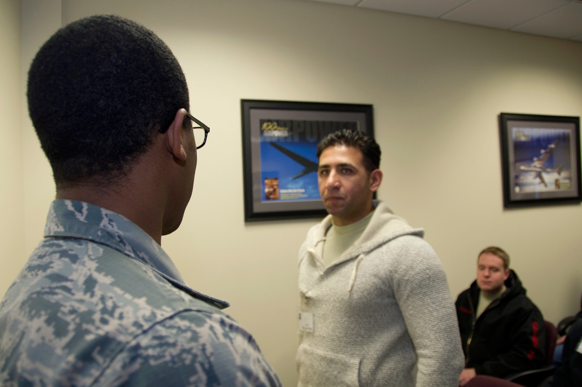 SCHRIEVER AIR FORCE BASE, Colo. -- Former Military Training Instructor, Staff Sgt. Matthew Coleman-Foster, asks Delayed Entry Program trainee, Haider Flayaah, a question Saturday, Jan. 7th, 2017. Staff Sgt. Coleman-Foster assisted in teaching the DEP trainees important drill and ceremony techniques that they will utilize in Basic Military Training. (U.S. Air Force photo/Staff Sgt. Christopher Moore)