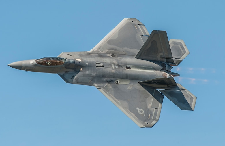 An Air Combat Command F-22 Raptor Demonstration Team aircraft flies during the AirPower over Hampton Roads Open House at Langley Air Force Base, Va., April 24, 2016. The team also works with the Air Force Heritage flight exhibiting the professional qualities the Air Force develops in the people who fly, maintain and support these aircraft. (U.S. Air Force photo/Senior Airman Kayla Newman)