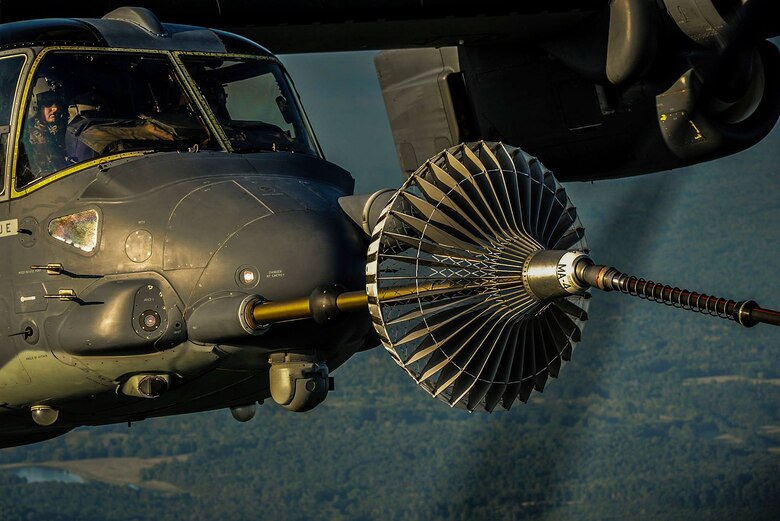 An Air Force CV-22 Osprey connects to an MC-130H Combat Talon II for refueling during a training mission over Hurlburt Field, Fla., Sept. 7, 2016. (U.S. Air Force photo/Airman 1st Class Joseph Pick)