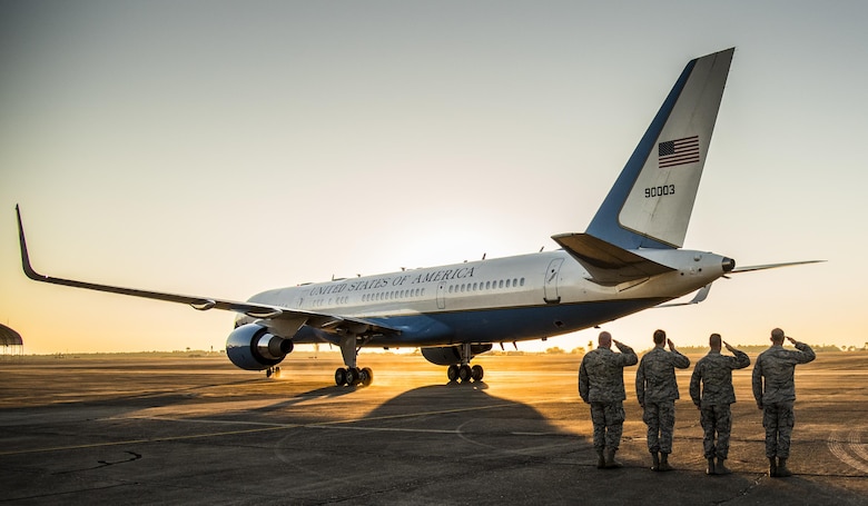 Base leadership salute as Defense Secretary Ash Carter’s aircraft taxies away after a visit to Eglin Air Force Base, Fla., Nov. 17, 2016. Carter visited numerous locations around Eglin AFB and Hurlburt Field, Fla. during his tour of the local area. (U.S. Air Force photo/Samuel King Jr.)