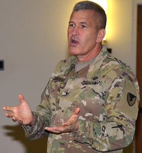 Brig. Gen. Jeffrey Gabbert addresses the importance of efficiencies and standardization to improve Army readiness with leaders from throughout the Mission and Installation Contracting Command as part of an acquisition leadership training event at Joint Base San Antonio-Fort Sam Houston Dec. 6, 2016. Gabbert is the MICC commanding general.