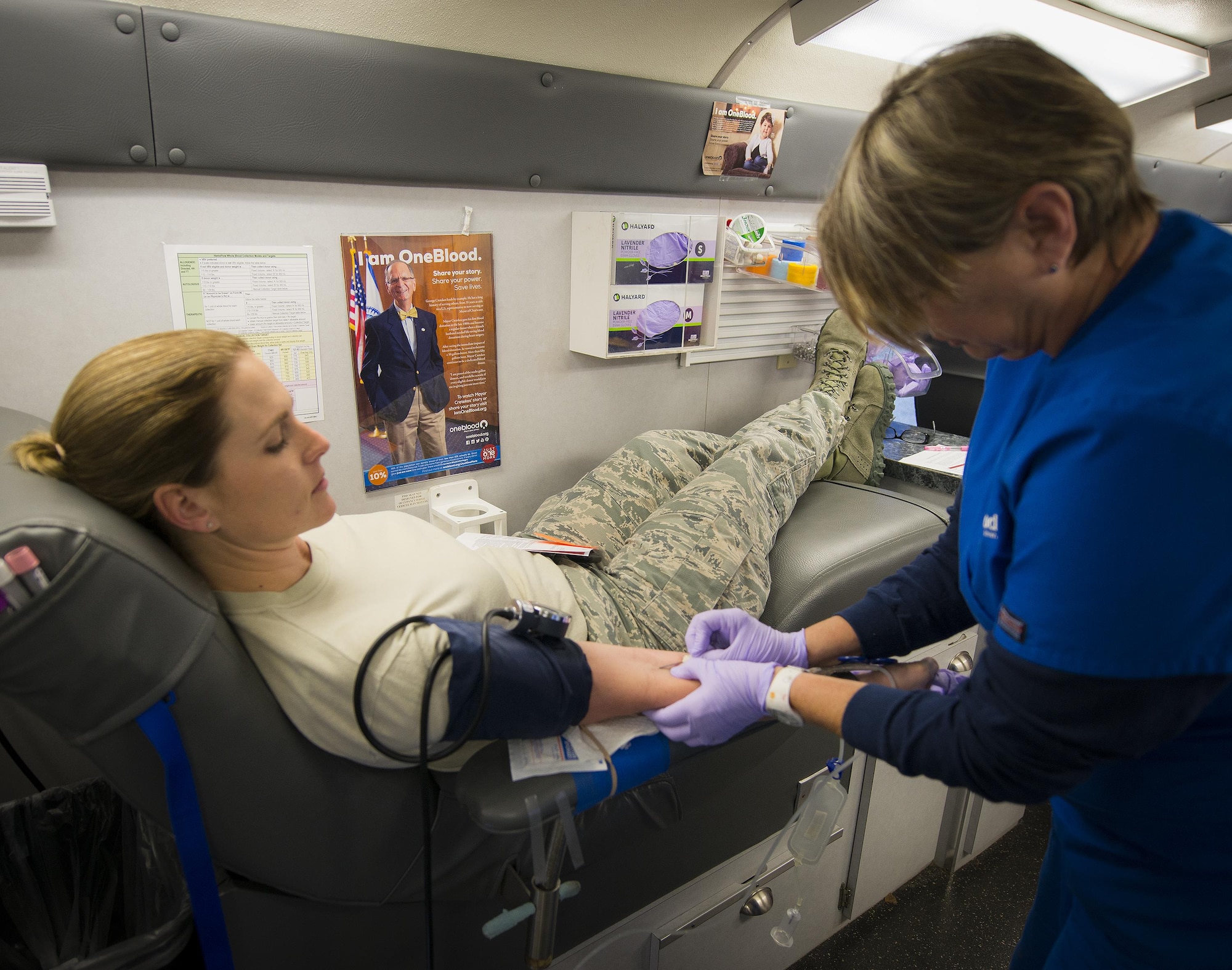Master Sgt. Christina Anger, 919th Special Operations Maintenance Group, gets the needle to begin donating blood Jan. 8 at Duke Field, Fla.  The Human Resource Development Council-sponsored blood drive was the group’s first event of the new year.  (U.S. Air Force photo/Tech. Sgt. Sam King)