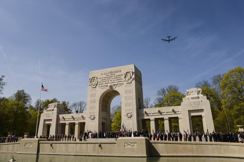 A B-52 Stratofortress flies over the Lafayette Escadrille Memorial in Marnes-la-Coquette, France, April 20, 2016, during a ceremony honoring the 268 Americans who joined the French air force before the U.S. officially engaged in World War I. In addition to the B-52, four F-22 Raptors, four French Mirage 2000Ns and a WWI-era Steerman PT-17 biplane performed flyovers during the ceremony commemorating the 100th anniversary of the Layfette Escadrille’s formation. (U.S. Air Force photo/Tech. Sgt. Joshua DeMotts)