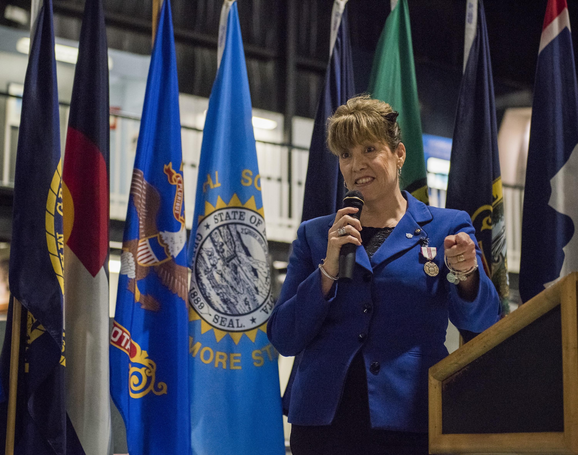 Lee McGehee, 96th Test Wing vice director, speaks to the audience during her retirement ceremony Jan. 5 at Eglin Air Force Base, Fla.  McGehee served the Air Force for more than 30 years.  (U.S. Air Force photo/Ilka Cole)