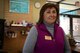 Joy Honeycutt, 20th Force Support Squadron Carolina Lakes Golf Course operations clerk, stands for a photo in the Pro Shop at the golf course at Shaw Air Force Base, S.C., Jan. 9, 2017. The Pro Shop offers a variety of quality golf gear, as well as certified custom club fitting services and club regripping. (U.S. Air Force photo by Airman 1st Class Kelsey Tucker)