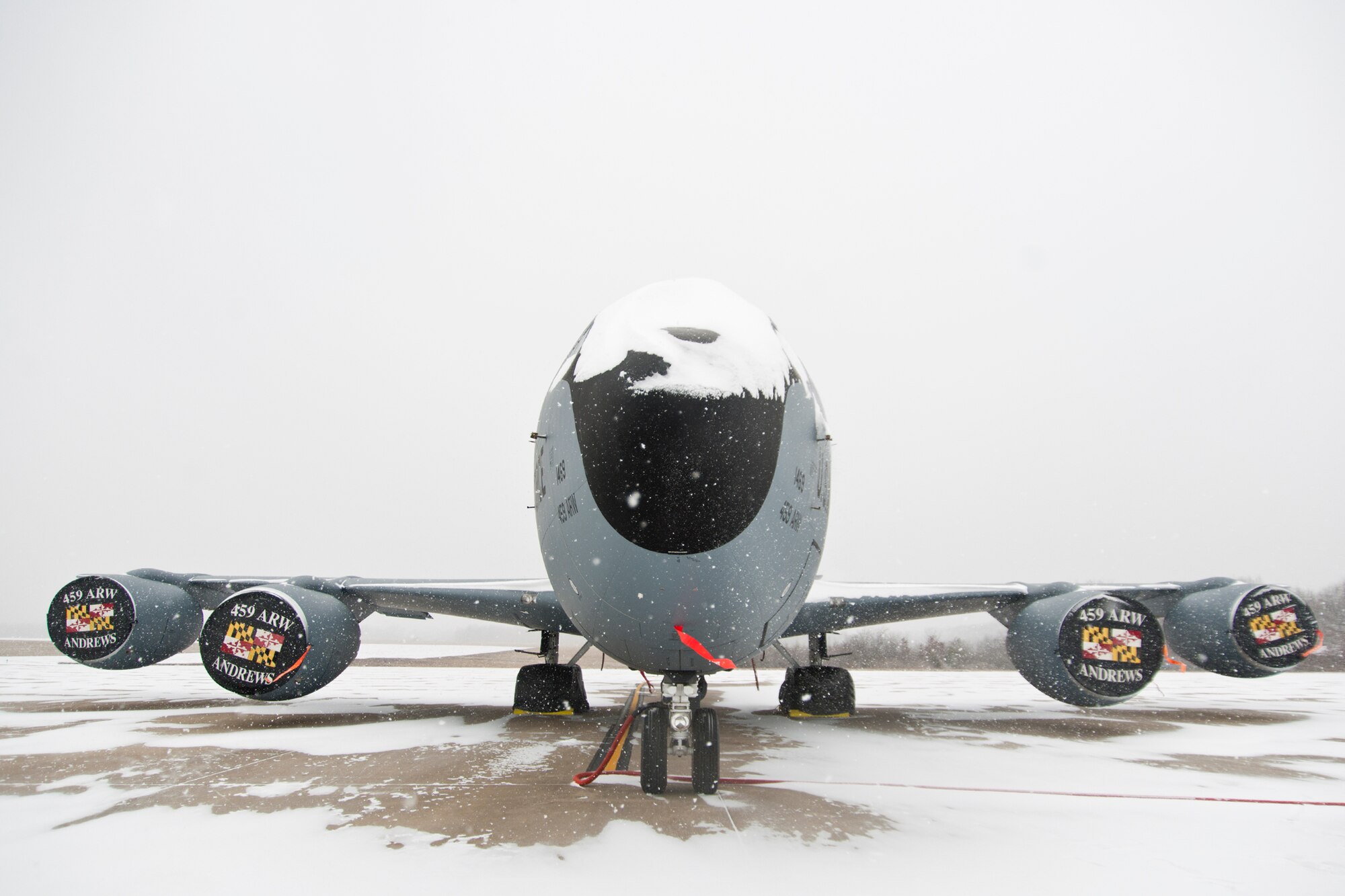 A KC-135R Stratotanker with the 459th Air Refueling Wing rests on the Joint Base Andrews, Maryland, flight line during the region's first winter storm of the season Jan. 8, 2017. Up to two inches fell in parts of the National Capital Region during the 459th's drill weekend. (U.S. Air Force photo/Tech. Sgt. Kat Justen)