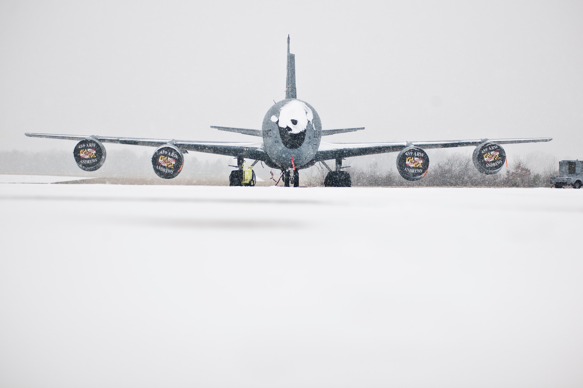 A KC-135R Stratotanker with the 459th Air Refueling Wing rests on the Joint Base Andrews, Maryland, flight line during the region's first winter storm of the season Jan. 8, 2017. Up to two inches fell in parts of the National Capital Region during the 459th's drill weekend. (U.S. Air Force photo/Tech. Sgt. Kat Justen)