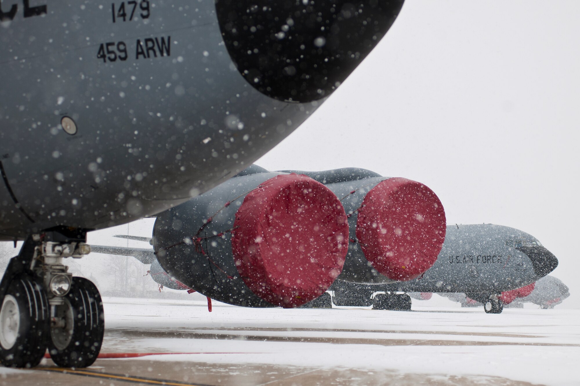 KC-135R Stratotankers with the 459th Air Refueling Wing rest on the Joint Base Andrews, Maryland, flight line during the region's first winter storm of the season Jan. 8, 2017. Up to two inches fell in parts of the National Capital Region during the 459th's drill weekend. (U.S. Air Force photo/Tech. Sgt. Kat Justen)